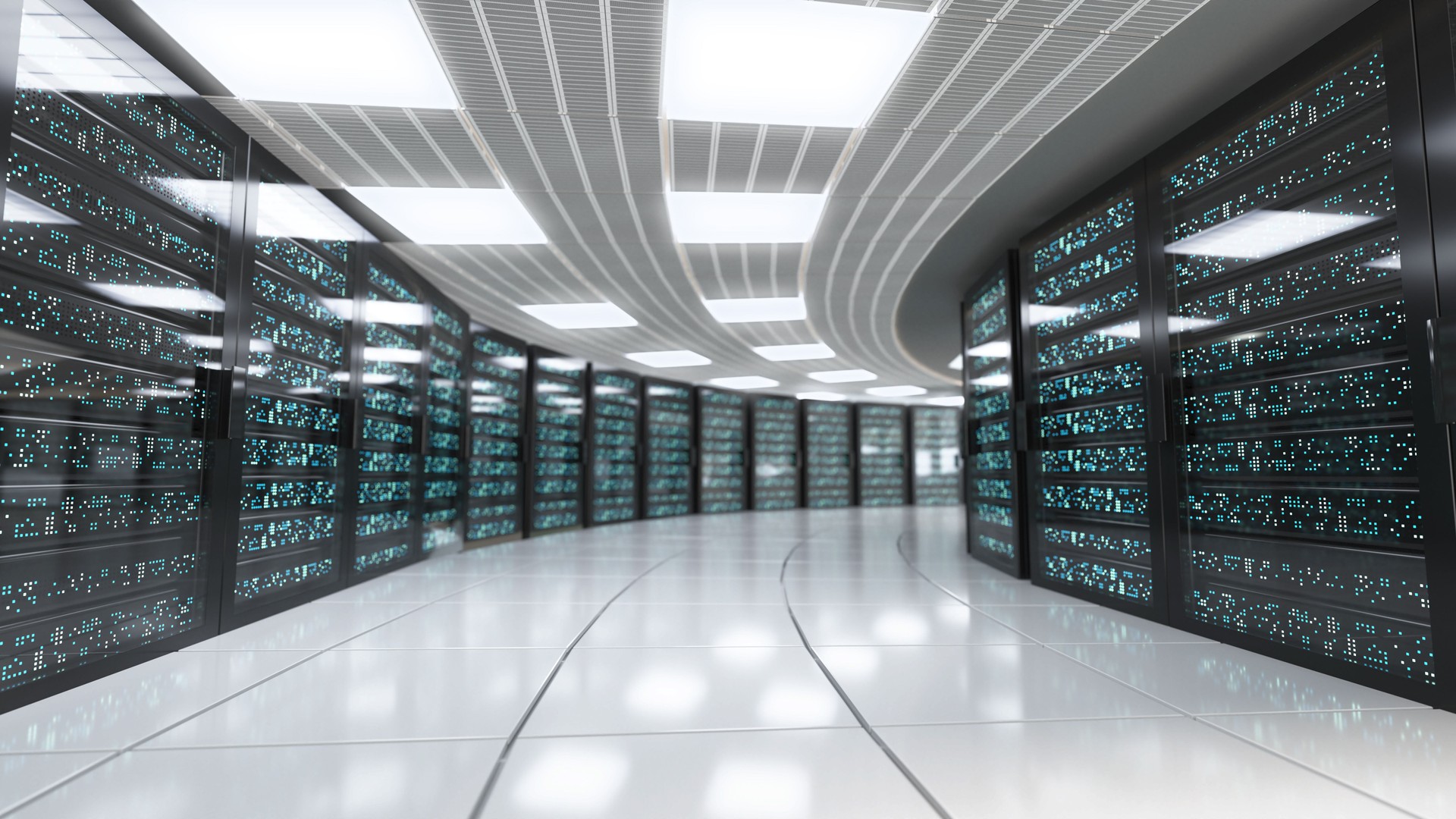 Data center corridor filled with servers illuminated by bright white light
